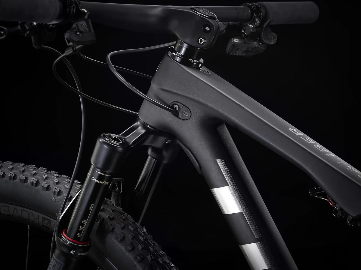 Supercaliber 9.8 GX AXS Matte Raw Carbon/Gloss Trek Black